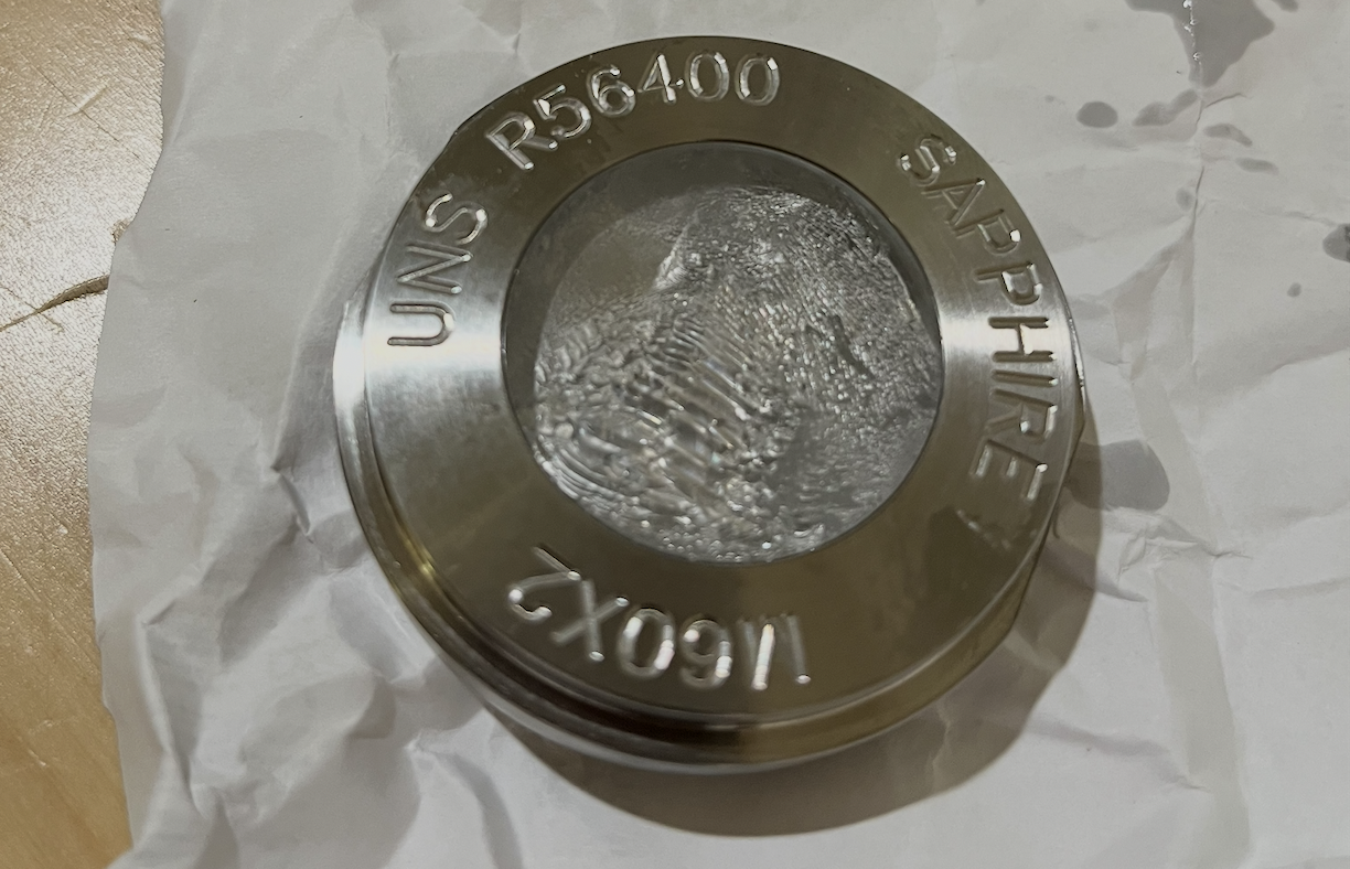 Tapered sapphire window cracked at 500bar (7250 pai)